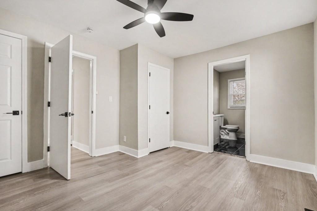 1515 Jonesboro Road Southeast Atlanta, GA 30315 - Photo 27 of 32 a view of empty room with wooden floor