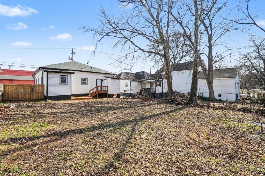 1515 Jonesboro Road Southeast Atlanta, GA 30315 - Photo 31 of 32 a front view of a house with a yard