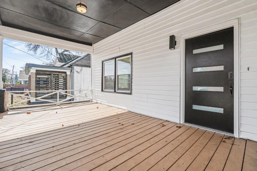 1515 Jonesboro Road Southeast Atlanta, GA 30315 - Photo 9 of 32 a view of a living room and wooden floor