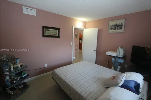a view of balcony with wooden floor