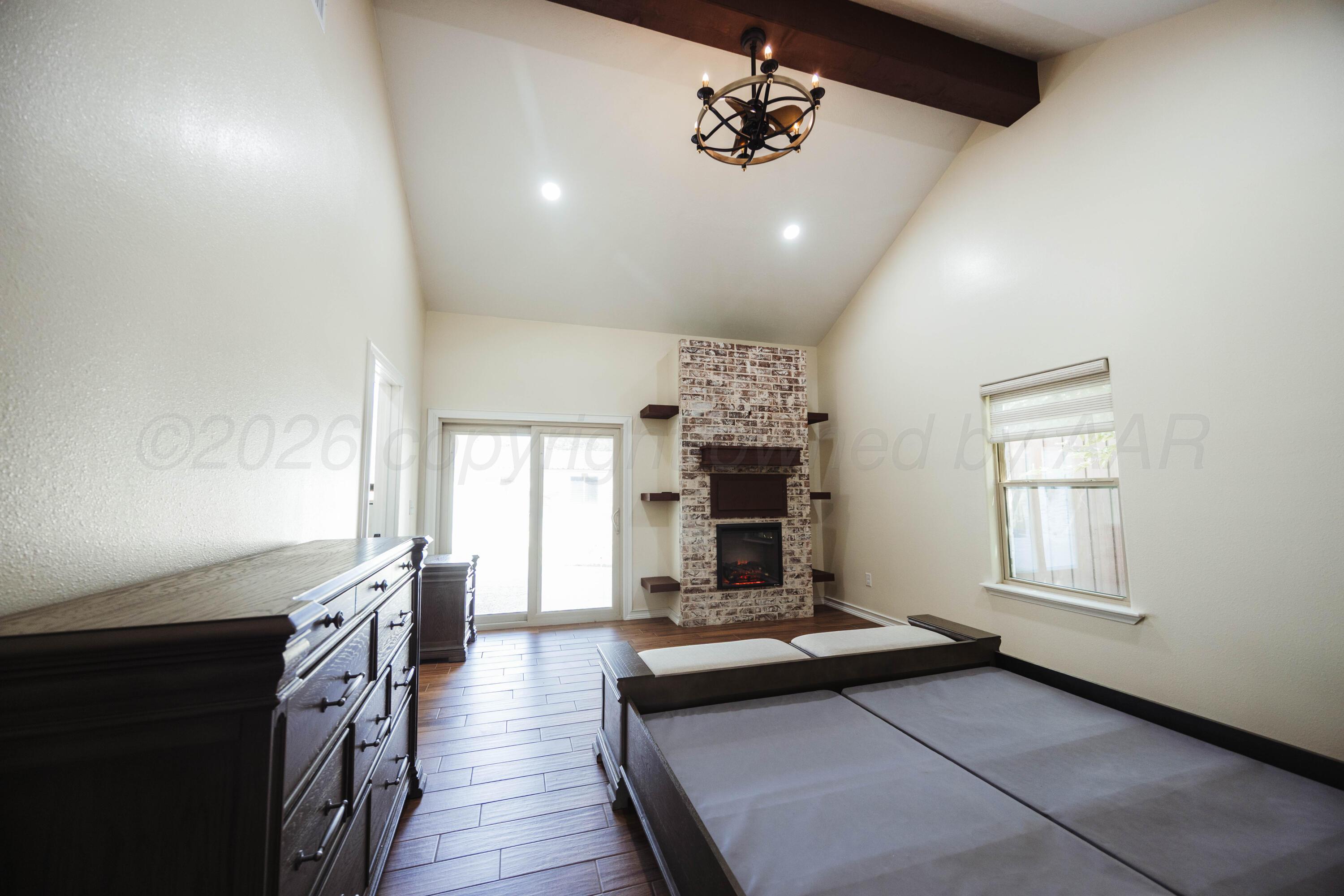 2009 Southwest 19th Avenue Perryton, TX 79070 - Photo 19 of 49 Master bedroom-fireplace