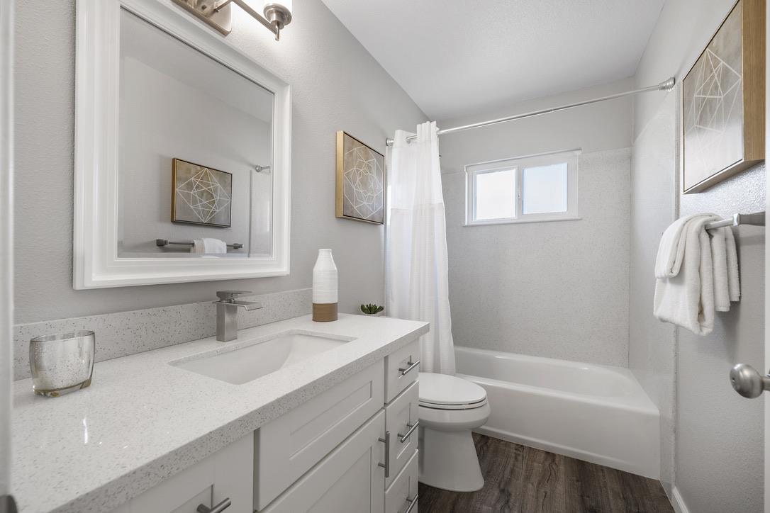 535 Hyde Park Drive San Jose, CA 95136 - Photo 17 of 28 a bathroom with a sink toilet and shower