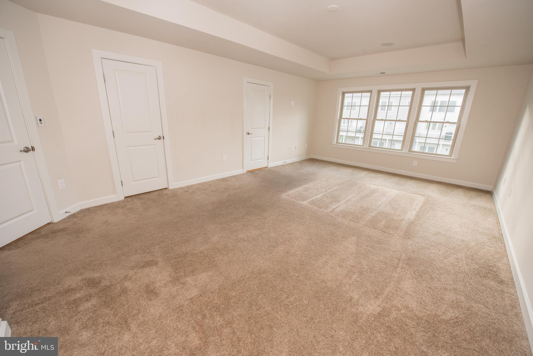 7444 Burnside Way Hanover, MD 21076 - Photo 23 of 46 an empty room with windows