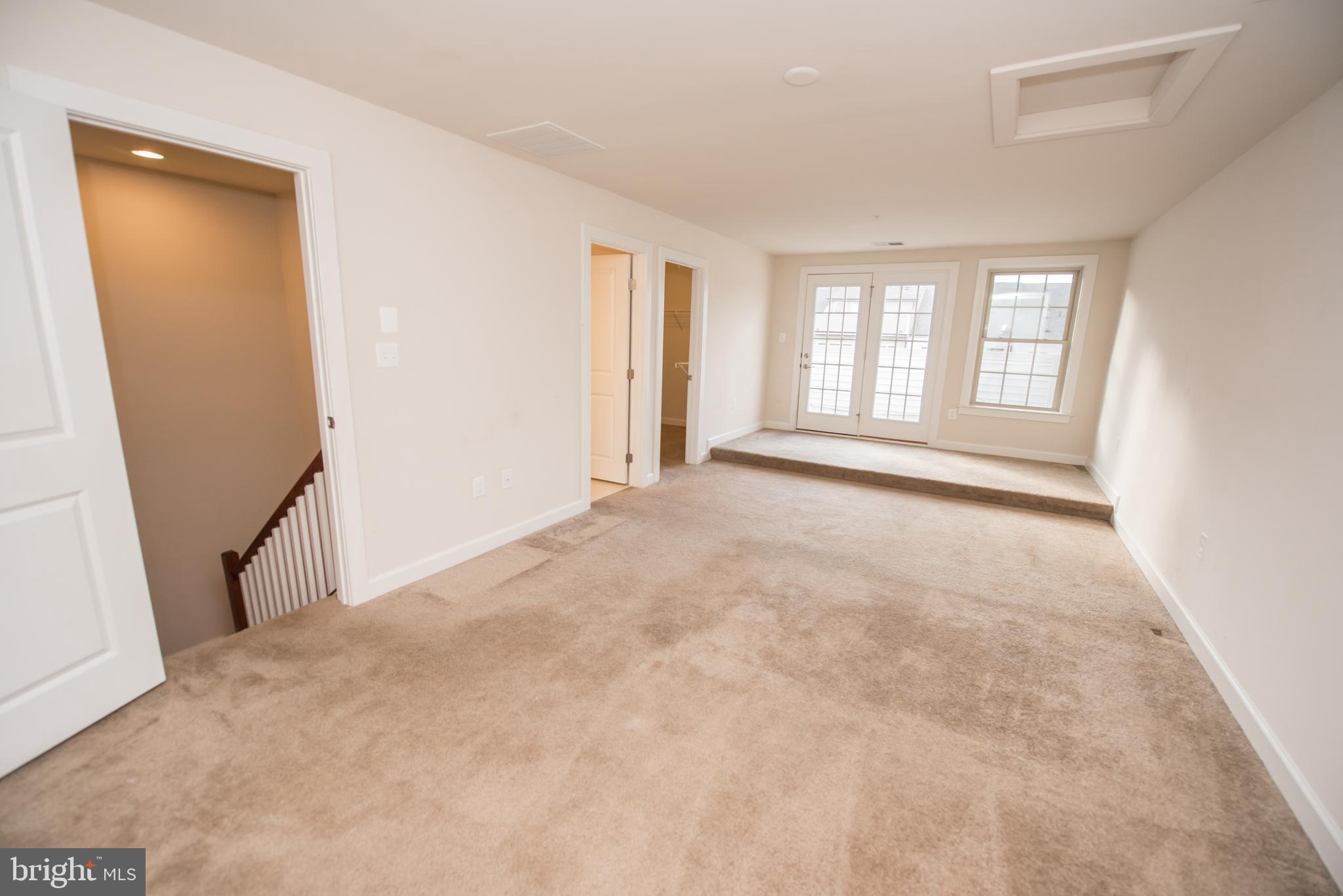 7444 Burnside Way Hanover, MD 21076 - Photo 34 of 46 an empty room with windows