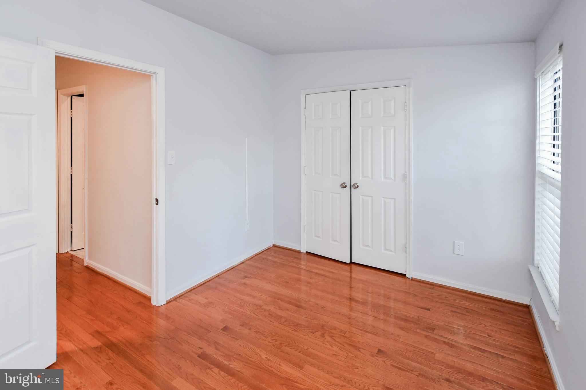 120 Forests Edge Place Laurel, MD 20724 - Photo 13 of 23 an empty room with wooden floor