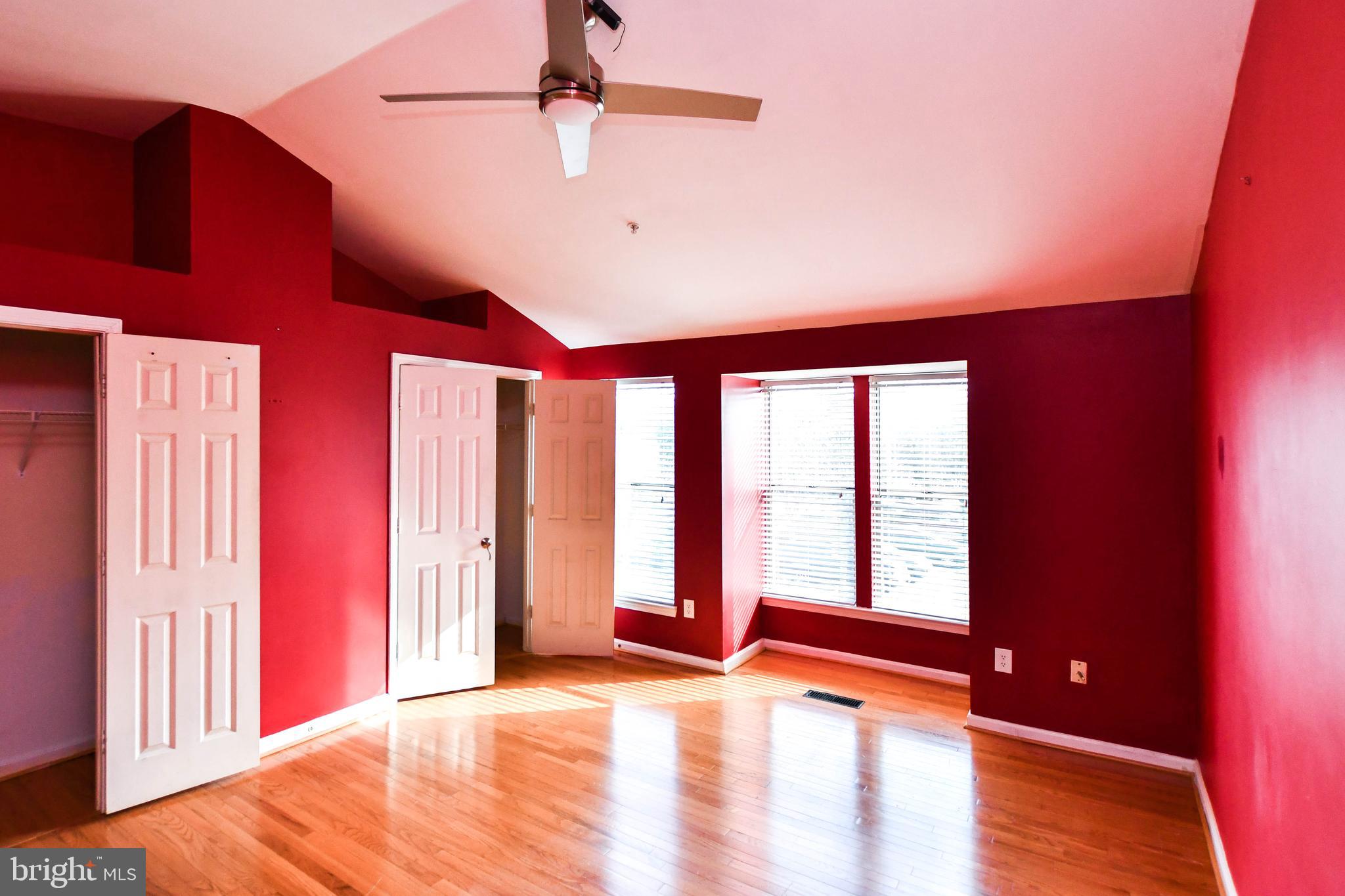 120 Forests Edge Place Laurel, MD 20724 - Photo 9 of 23 a view of an empty room with window and wooden floor
