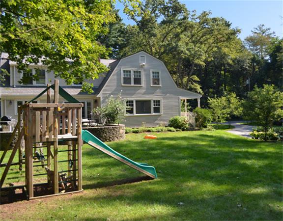 35 Pinecroft Road Weston, MA 02493 - Photo 16 of 17 a front view of house with yard and green space