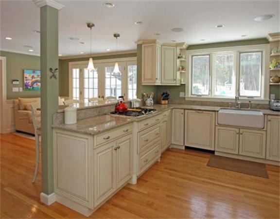 35 Pinecroft Road Weston, MA 02493 - Photo 5 of 17 a kitchen with stainless steel appliances a sink stove and cabinets