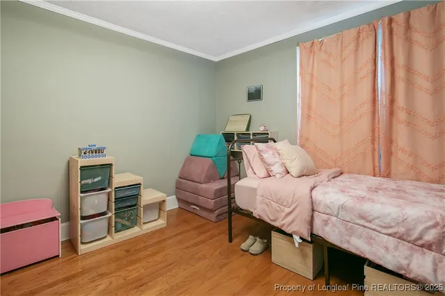 a bedroom with a bed and a closet