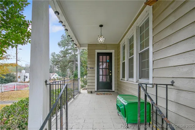 a front view of a house with a porch