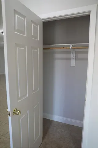 a view of a room with rack on the wall