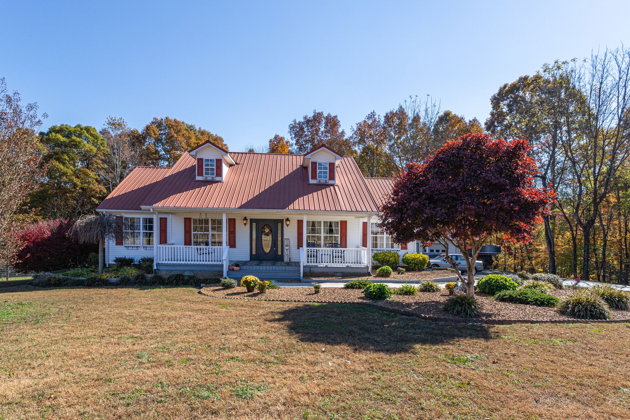 1257 Lyndell Bell Road Manchester, TN 37355 - Photo 2 of 50 a front view of a house with a yard covered in snow