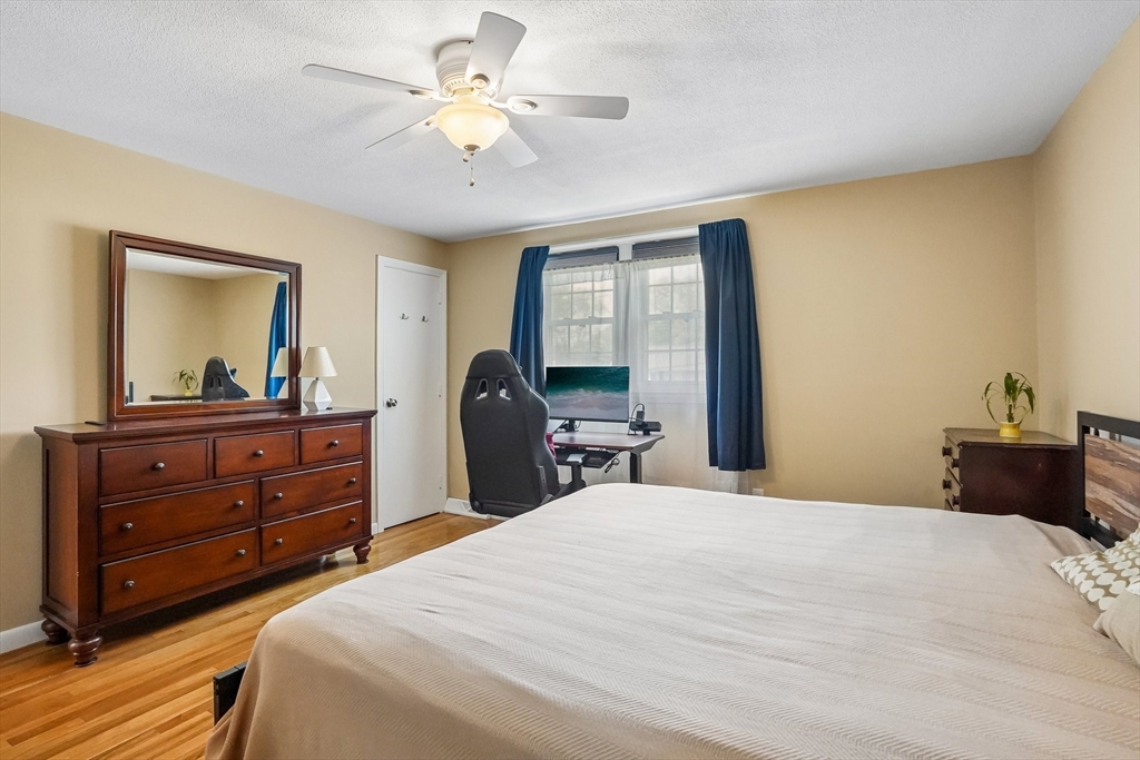 35 Westgate Road Framingham, MA 01701 - Photo 25 of 37 a bedroom with a bed and a dresser