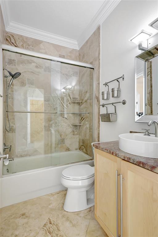 2863 Duncan Tree Circle Valrico, FL 33594 - Photo 21 of 53 a bathroom with a granite countertop sink toilet and shower