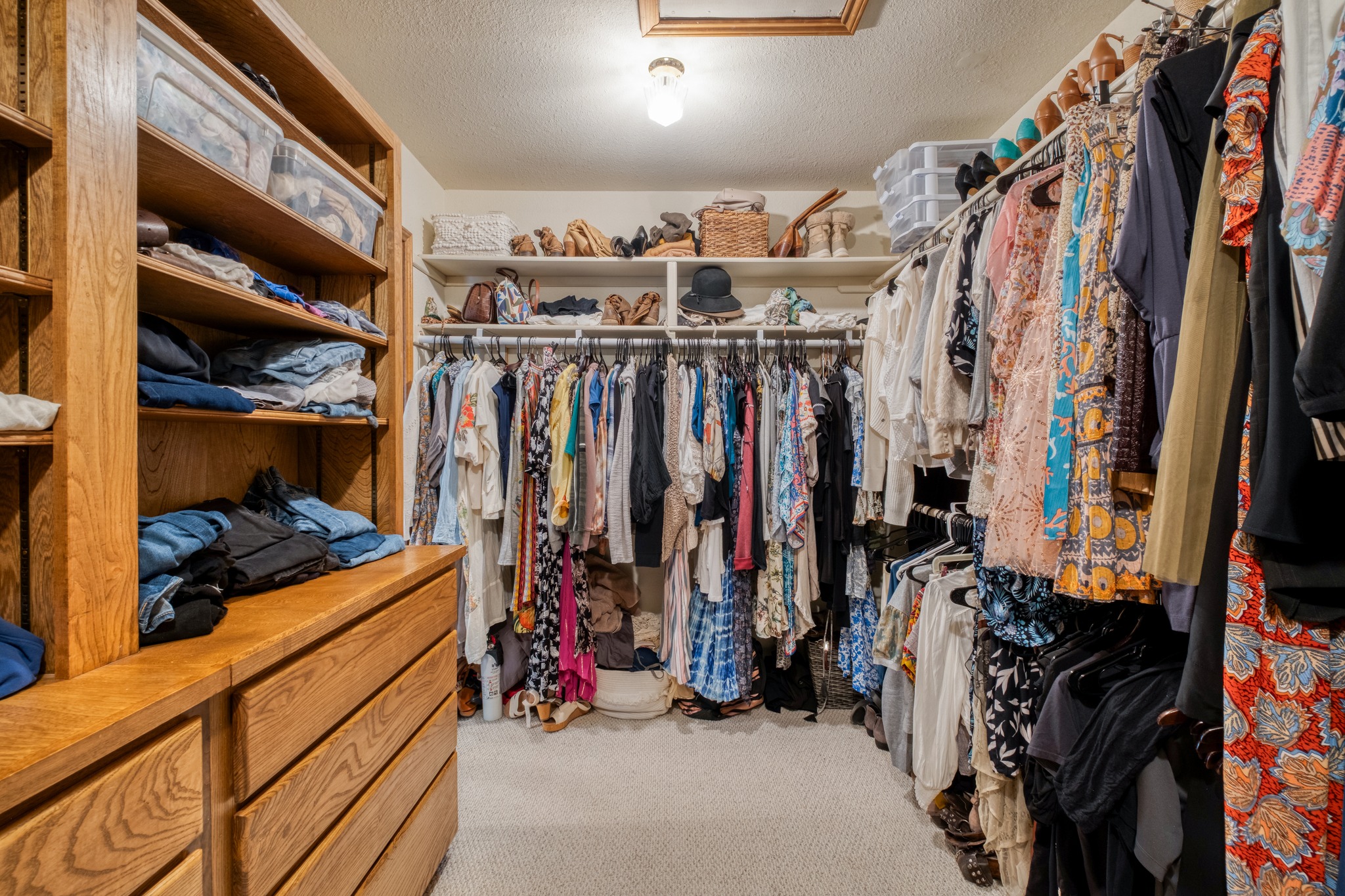 202 Ridgewood Drive Georgetown, TX 78628 - Photo 22 of 40 a view of walk in closet with clothes