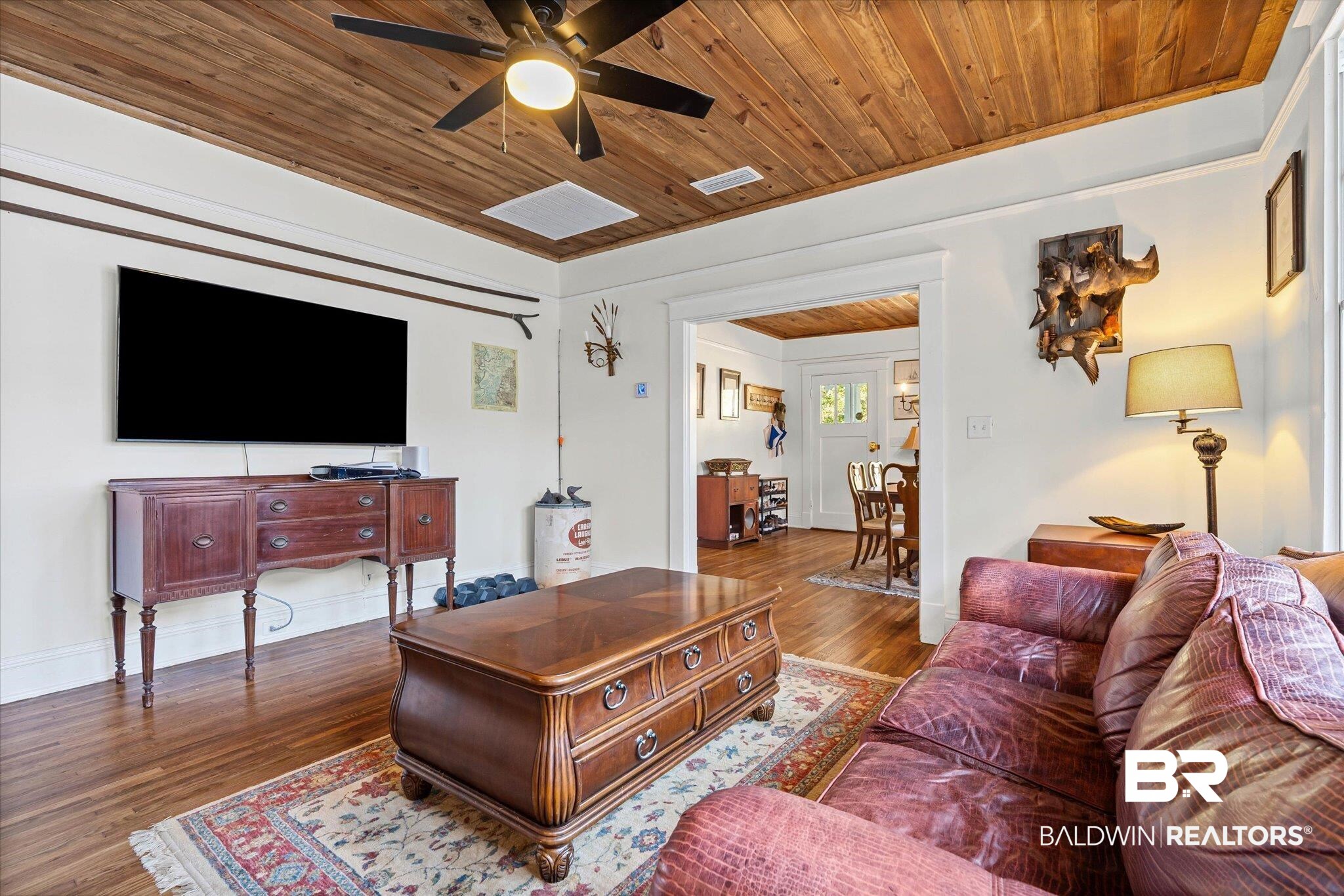 11 South Lafayette Street Mobile, AL 36604 - Photo 7 of 20 Living room featuring wood finished floors, wooden ceiling, and ceiling fan