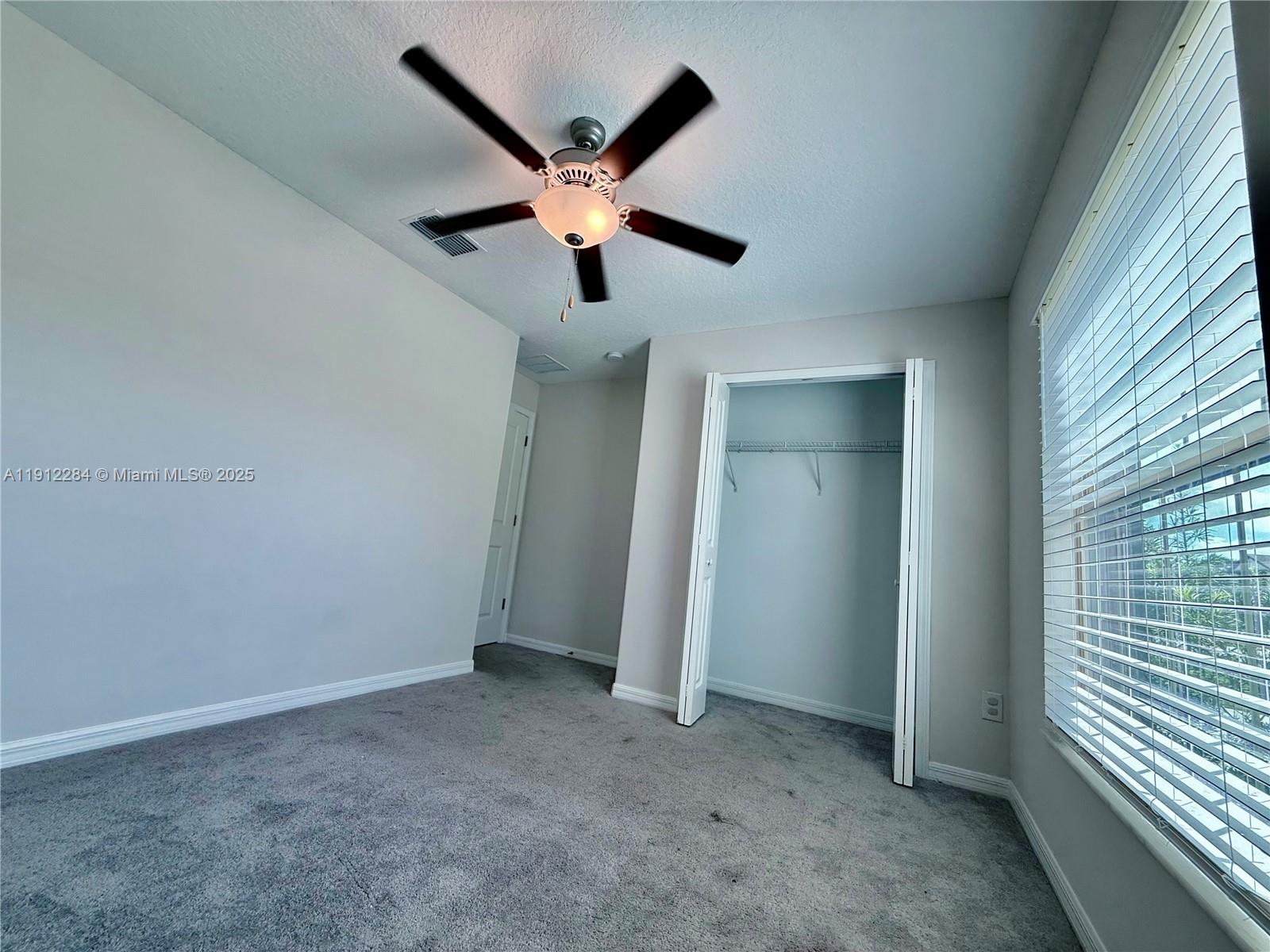 39889 Harmon Grove Court Zephyrhills, FL 33540 - Photo 25 of 55 an empty room