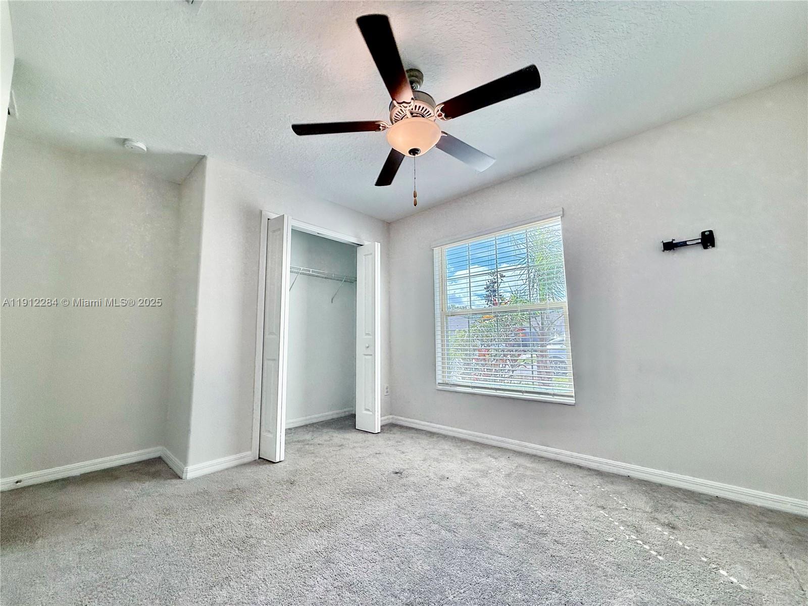 39889 Harmon Grove Court Zephyrhills, FL 33540 - Photo 26 of 55 a view of an empty room with a window