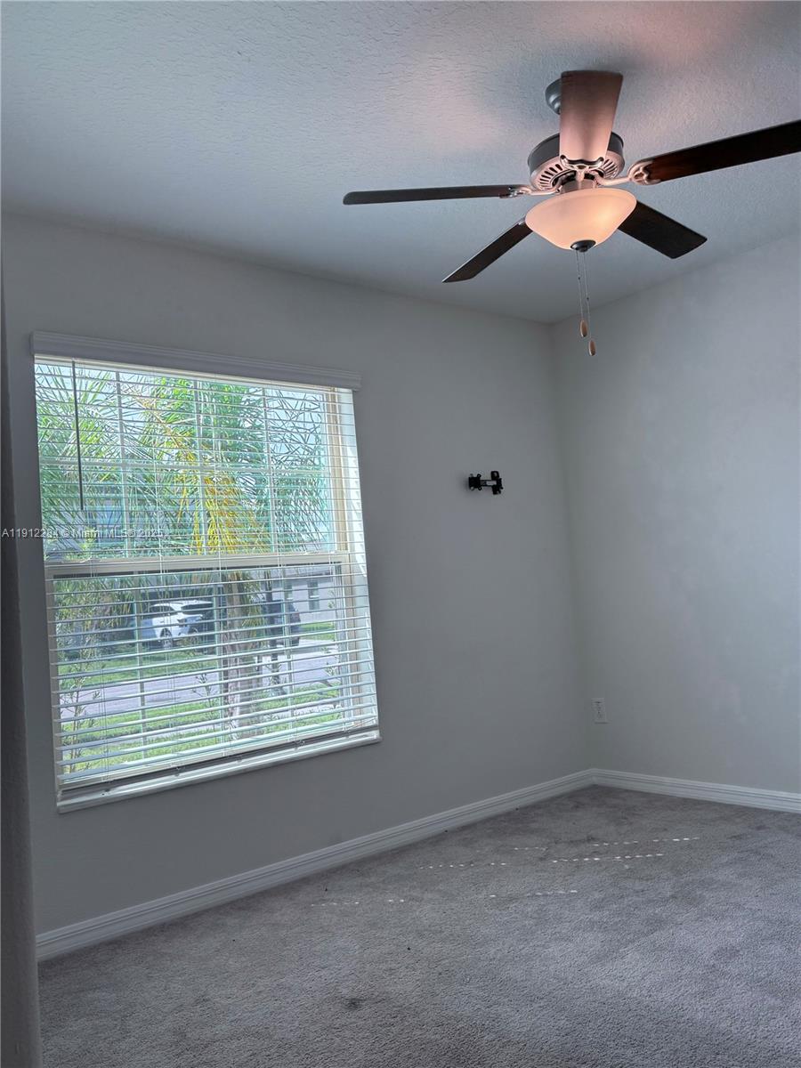 39889 Harmon Grove Court Zephyrhills, FL 33540 - Photo 27 of 55 an empty room with a window