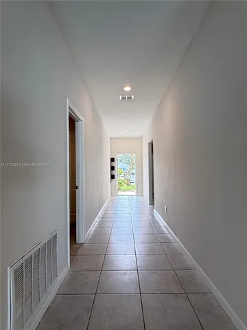 a room with a mirror and gym equipment