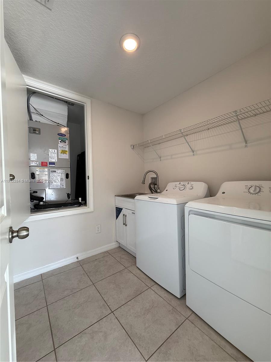 39889 Harmon Grove Court Zephyrhills, FL 33540 - Photo 31 of 55 a view of utility room