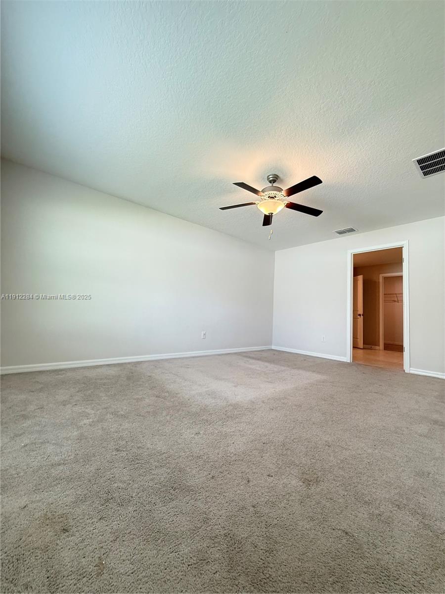 39889 Harmon Grove Court Zephyrhills, FL 33540 - Photo 33 of 55 a view of a big room with carpet