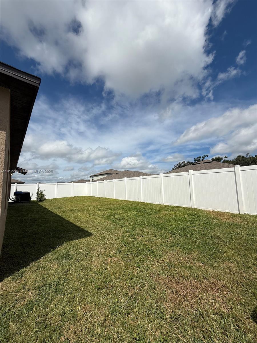 39889 Harmon Grove Court Zephyrhills, FL 33540 - Photo 50 of 55 a view of a backyard