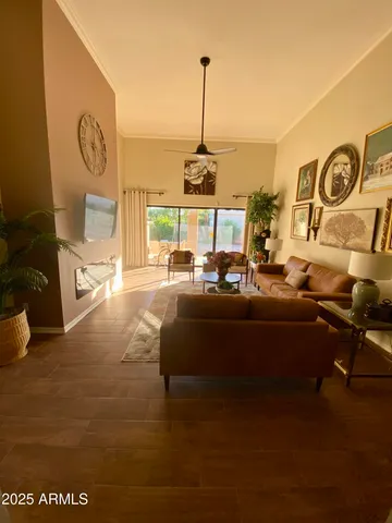 a living room with furniture and a window