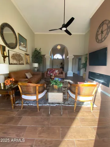a living room with a couch and a flat screen tv