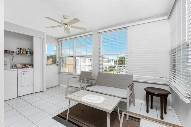 a living room with furniture and a window