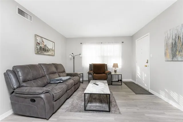 a living room with furniture and a couch