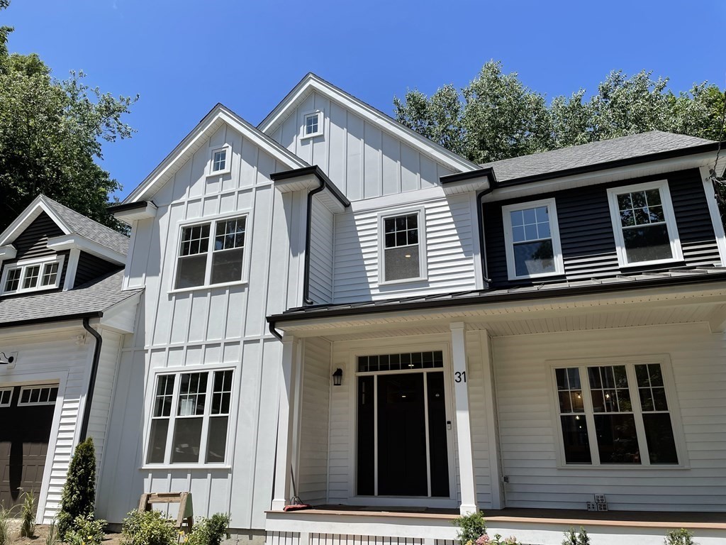 31 Kenilworth Road Arlington, MA 02476 - Photo 1 of 41 a front view of a house with a yard