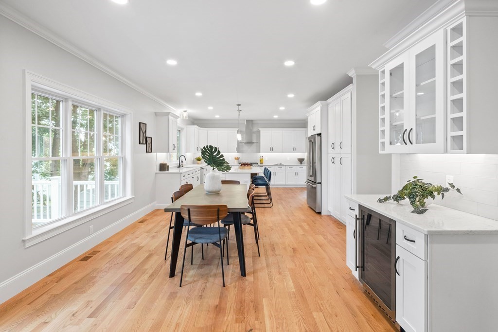 31 Kenilworth Road Arlington, MA 02476 - Photo 12 of 41 a dining room with furniture and wooden floor