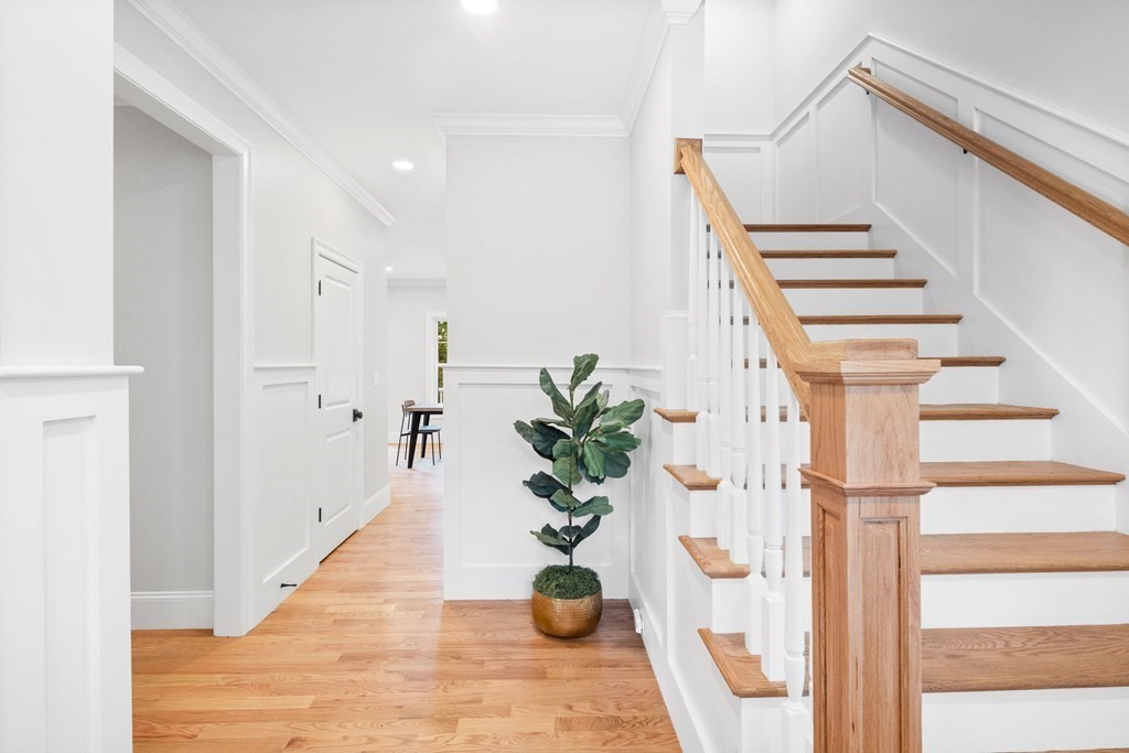 31 Kenilworth Road Arlington, MA 02476 - Photo 17 of 41 a view of entryway and hall with wooden floor