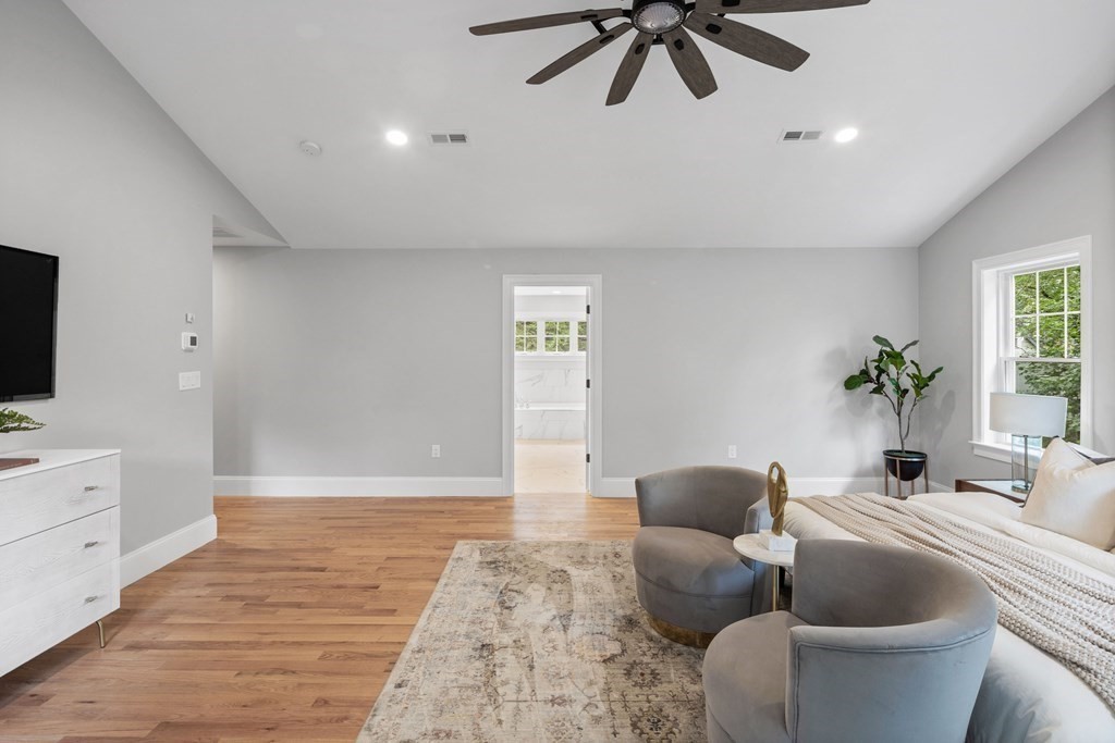 31 Kenilworth Road Arlington, MA 02476 - Photo 21 of 41 a living room with furniture and a flat screen tv