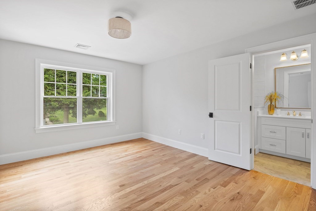 31 Kenilworth Road Arlington, MA 02476 - Photo 28 of 41 a view of empty room with window and cabinet