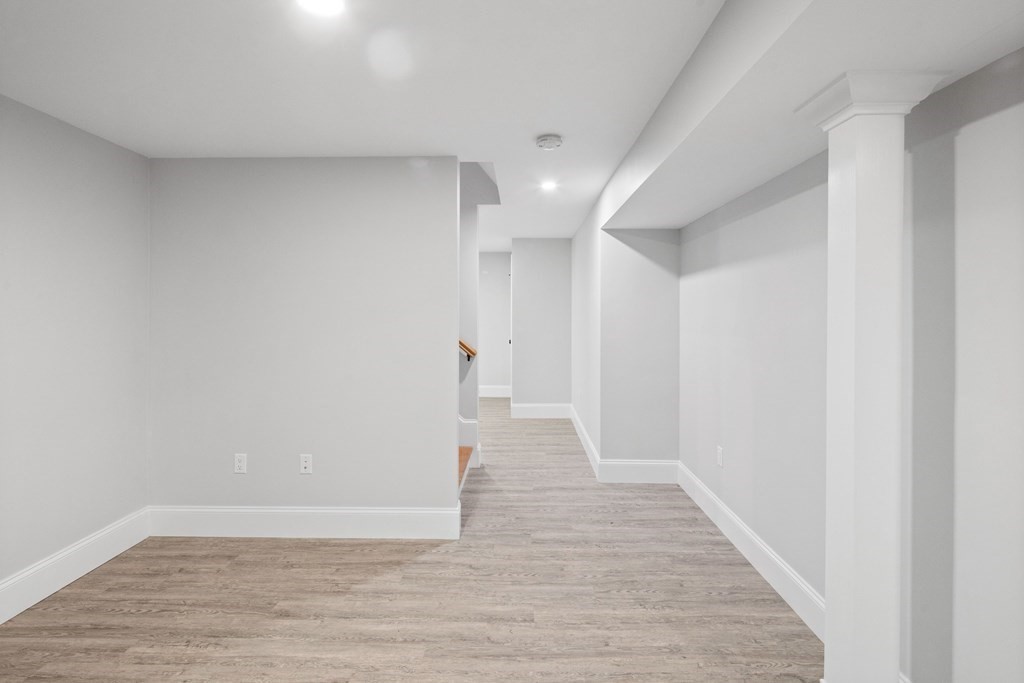 31 Kenilworth Road Arlington, MA 02476 - Photo 36 of 41 a view of a hallway with wooden floor