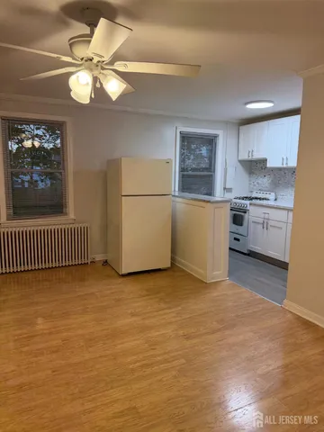 a workspace with furniture and window