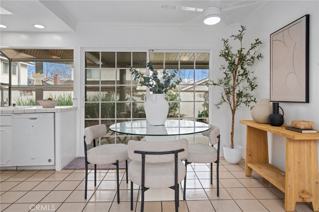 2181 Maple Court Tustin, CA 92780 - Photo 11 of 29 a view of a dining room with furniture and a potted plant