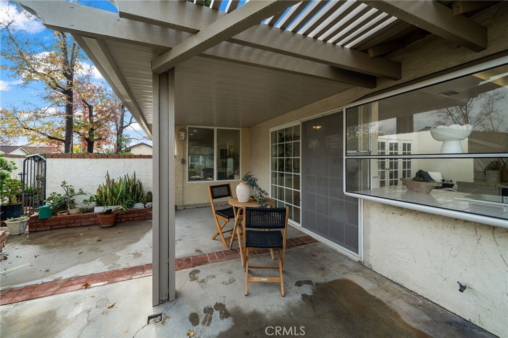 2181 Maple Court Tustin, CA 92780 - Photo 12 of 29 a backyard of a house with outdoor seating