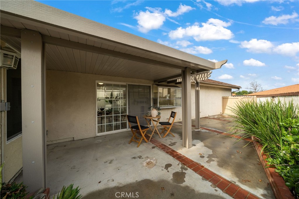 2181 Maple Court Tustin, CA 92780 - Photo 13 of 29 Paved are in backyard space, room to garden or for your furry friends.
