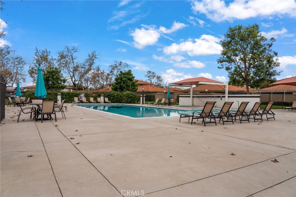 2181 Maple Court Tustin, CA 92780 - Photo 23 of 29 a view of a backyard with sitting area