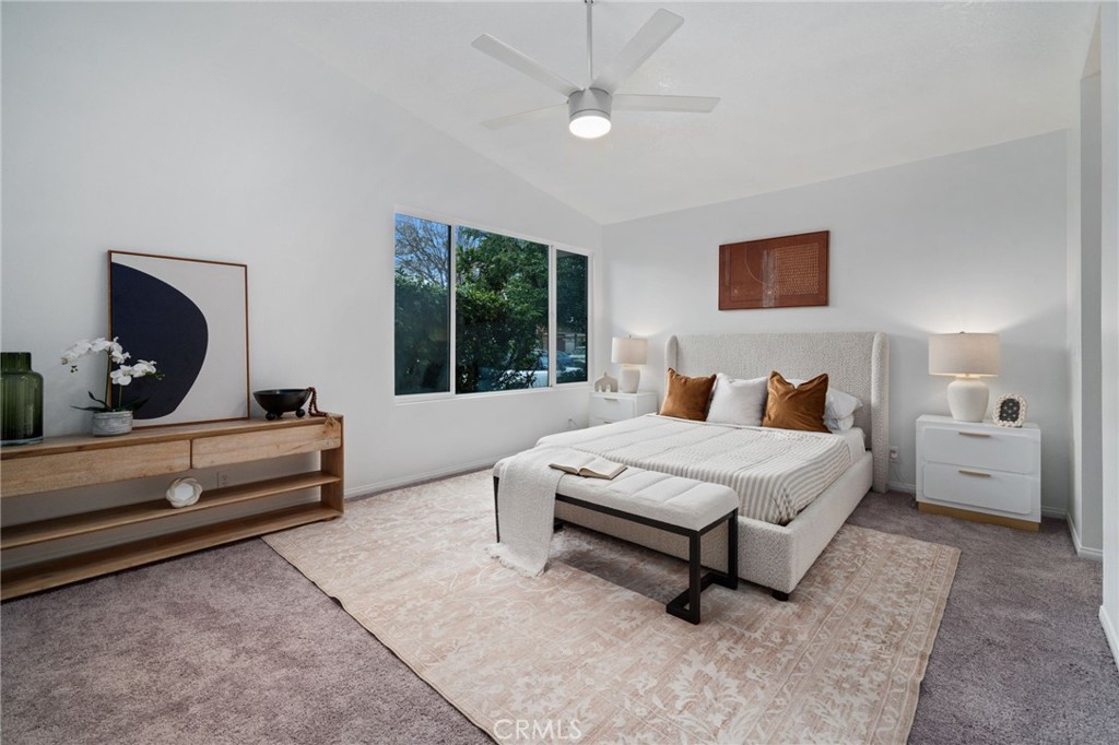 2181 Maple Court Tustin, CA 92780 - Photo 7 of 29 a bedroom with a bed and a flat screen tv