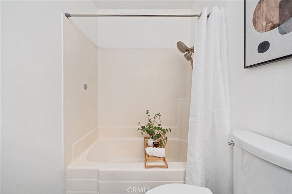 2181 Maple Court Tustin, CA 92780 - Photo 10 of 29 a bathroom with a shower