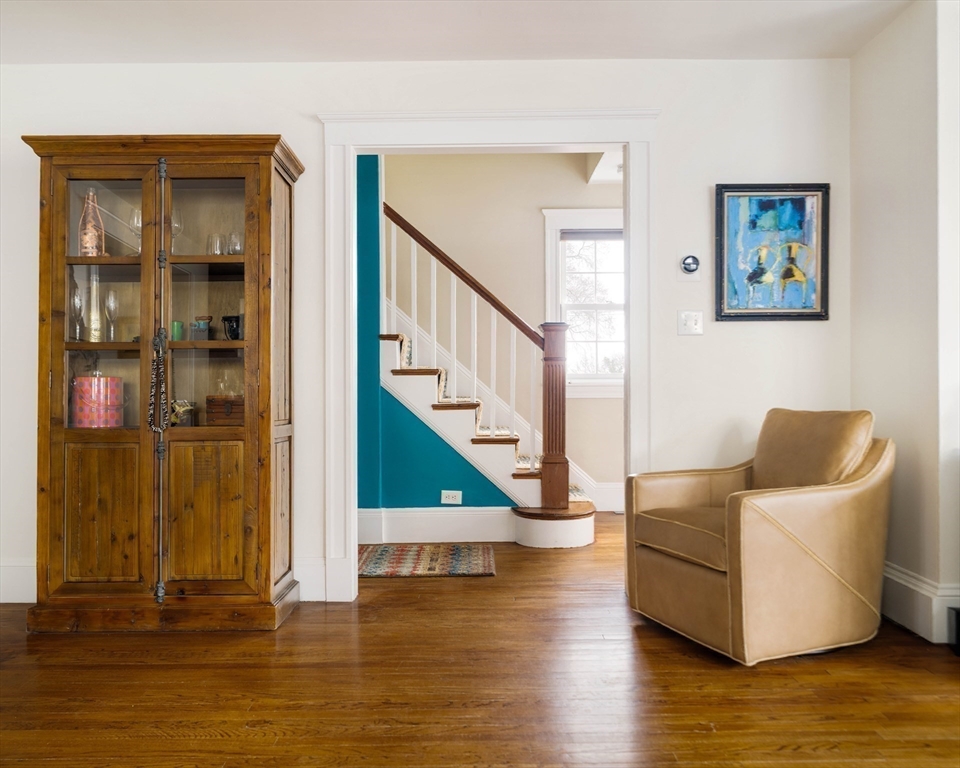 9 Eastern Avenue Arlington, MA 02476 - Photo 16 of 40 a view of entryway and hall with wooden floor