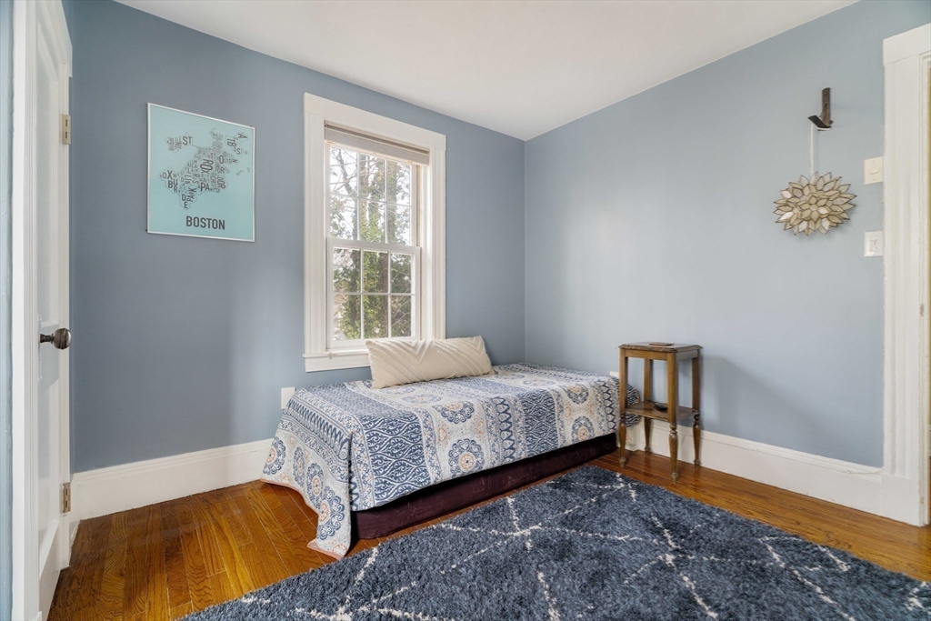 9 Eastern Avenue Arlington, MA 02476 - Photo 26 of 40 a bedroom with a bed and a window