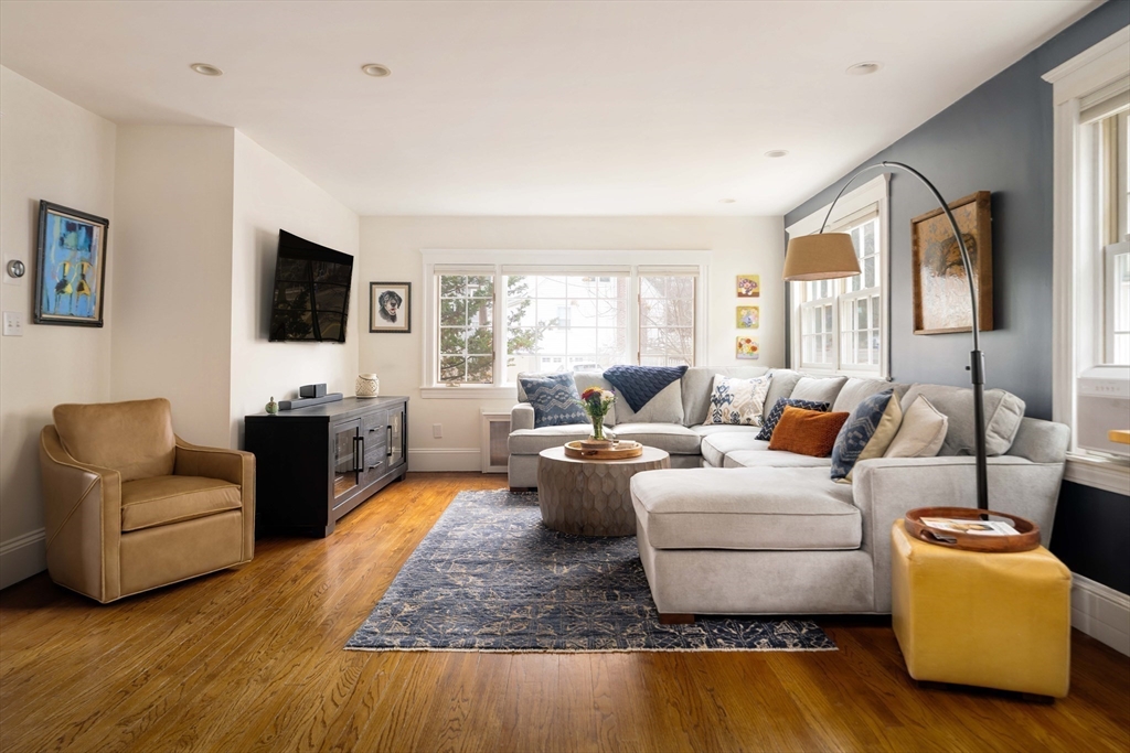 9 Eastern Avenue Arlington, MA 02476 - Photo 3 of 40 a living room with furniture and a flat screen tv