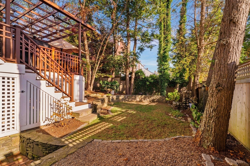 9 Eastern Avenue Arlington, MA 02476 - Photo 39 of 40 a view of a yard with trees