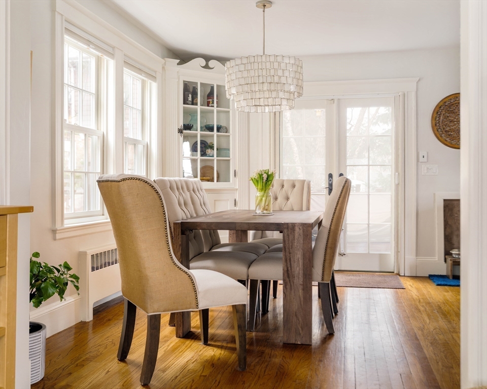 9 Eastern Avenue Arlington, MA 02476 - Photo 6 of 40 a view of a dining room with furniture window and wooden floor