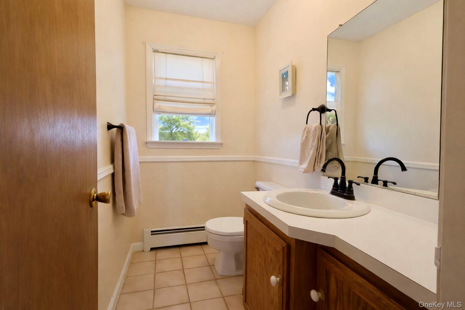 20 Day Road Campbell Hall, NY 10916 - Photo 11 of 41 a bathroom with a sink a toilet and shower